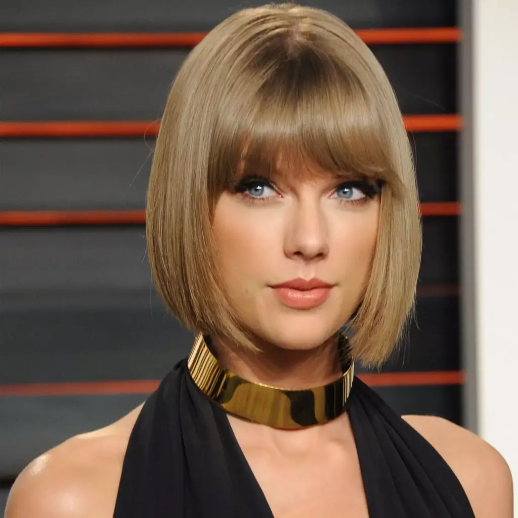 Idealne in zgrešene pričeske za podolgovat obraz 7 Oster bob s šiškami, ki ustvarja vodoravni okvir in skrajša podolgovati obraz