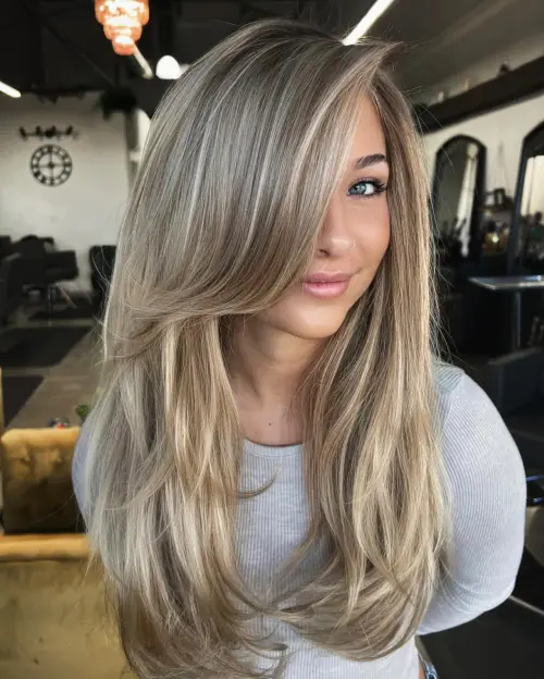 dolga priceska z gostim frufrujem do sredine lasi za tanke lase