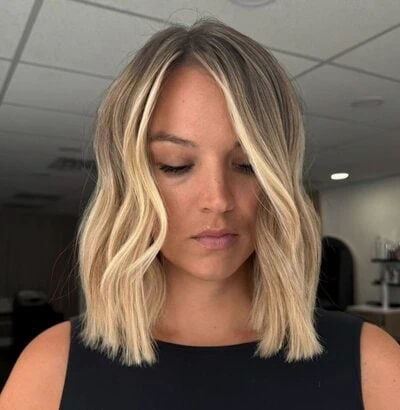 Idealne in zgrešene pričeske za podolgovat obraz 21 lob s sredinskimi valovi poldogovat obraz